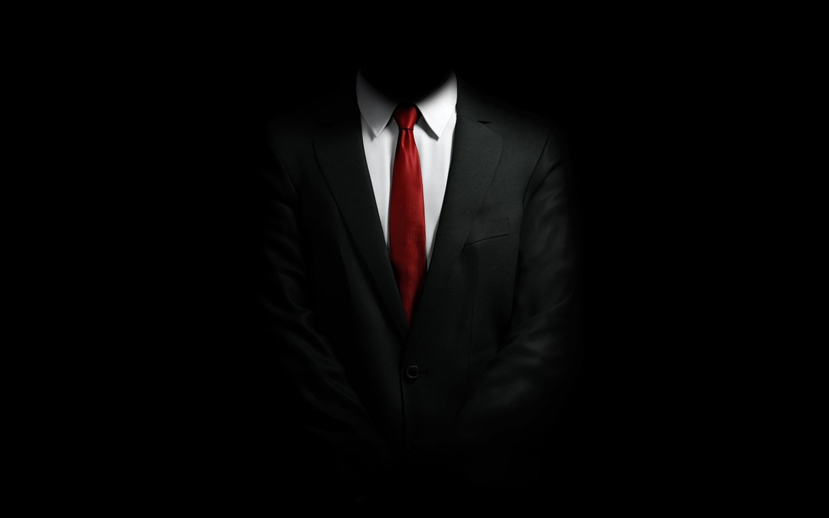 Черный мужской фон. Черный пиджак красный галстук. Человек в костюме в темноте. Смокинг на черном фоне. Костюм на черном фоне.