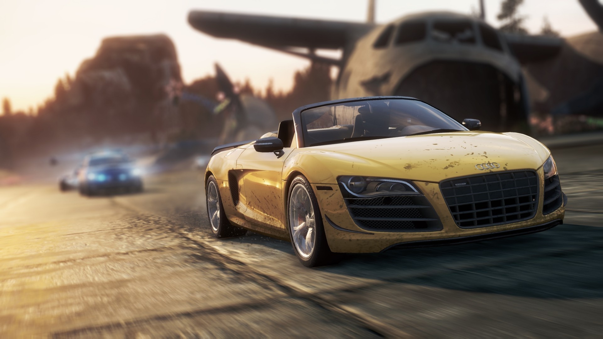 Скачать обои погоня, пыль, аэродром, need for speed most wanted 2, Audi R8  GT Spyder, раздел игры в разрешении 2048x1152