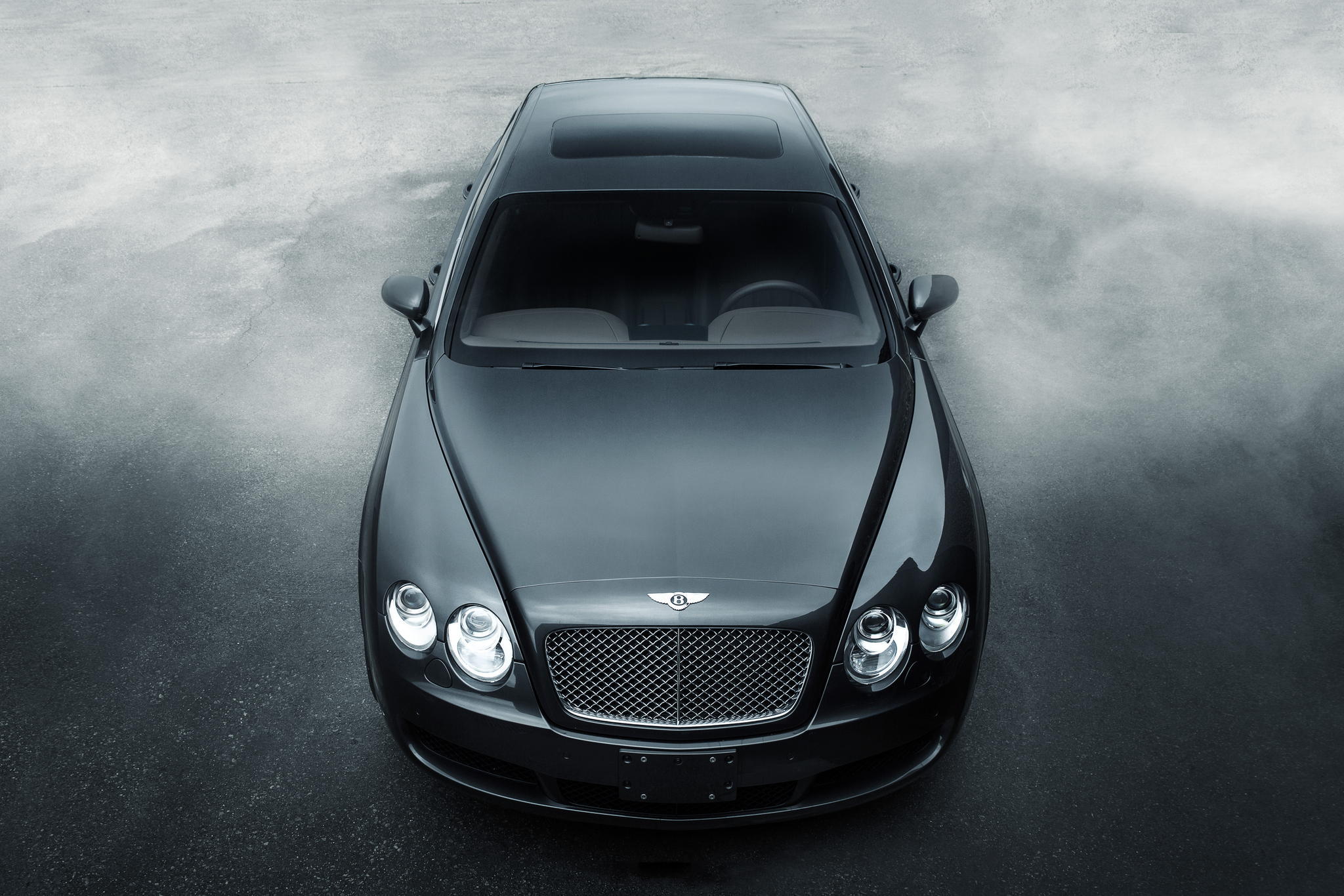 Черная машина перед. Бентли Континенталь черный. Машина Бентли черная. Bentley Continental gt на черном фоне. Бентли ГТ перед.