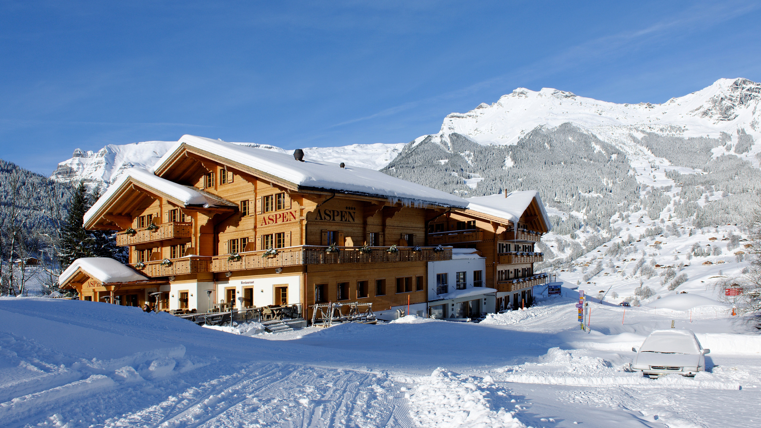 Горы снег дома. Аспен Швейцария. Швейцария Гриндельвальд зима. Гриндельвальд Швейцария отель Aspen. Долина Лаутербруннен Швейцария.