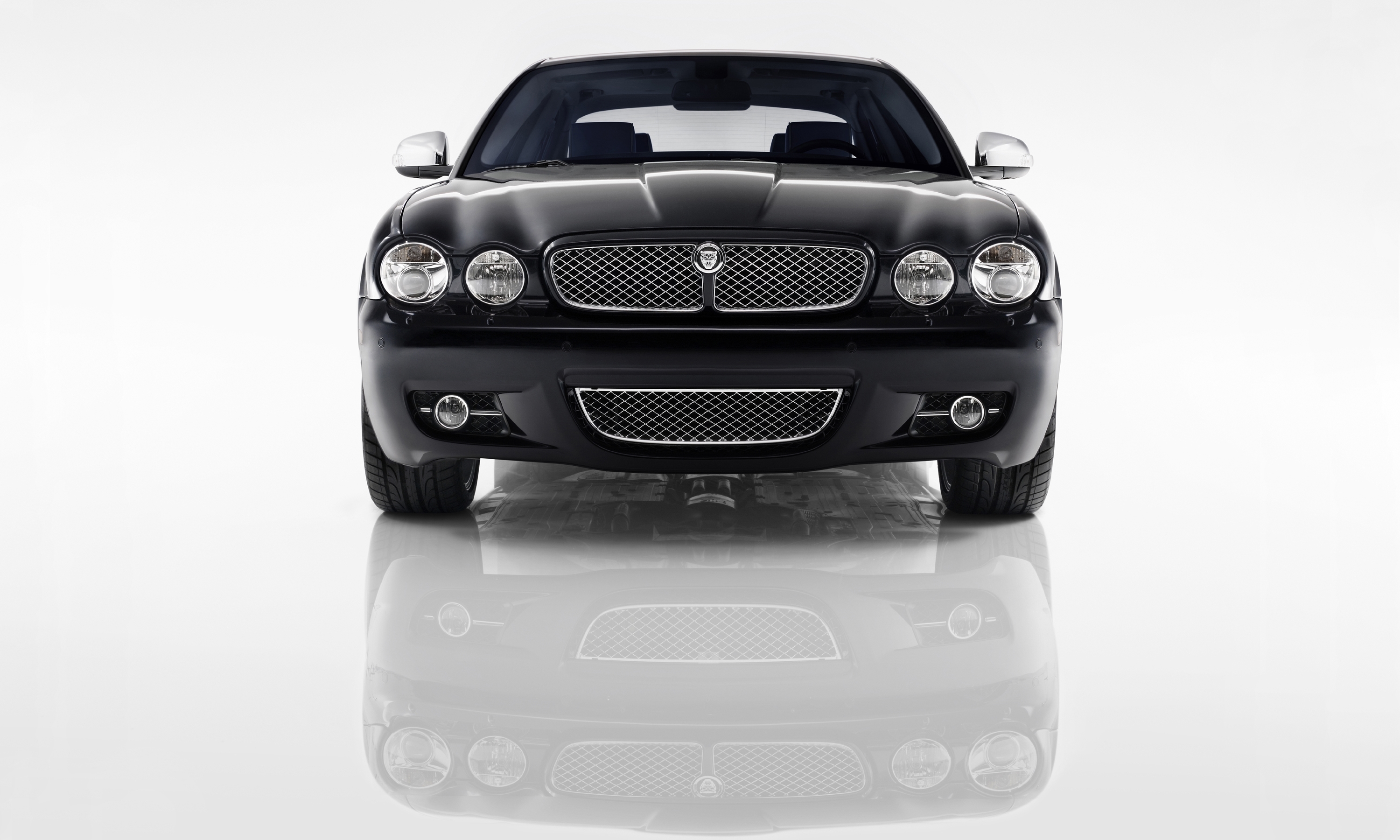Черная машина перед. Ягуар x350. Jaguar XJ 2009. Ягуар машина XJ 2008. Jaguar XJ x350.