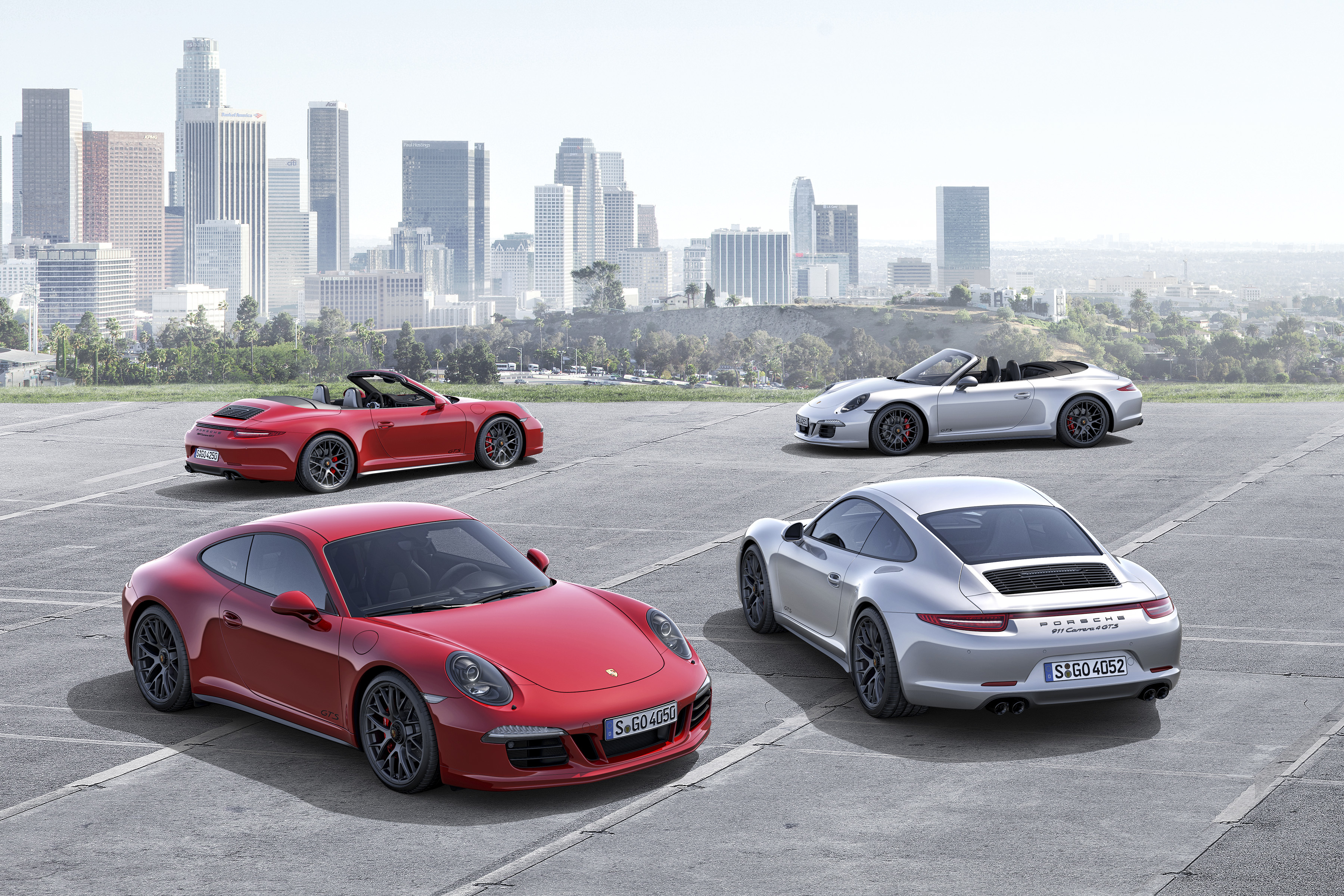 Четверо машин. Porsche 911 Carrera GTS. Порше 911 Каррера 2015. Порше 911 Каррера GTS. 911 Carrera 4 GTS.