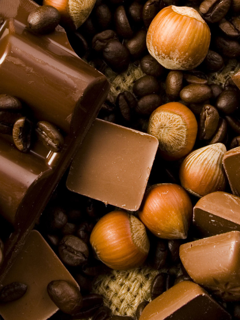 Шоколадные конфеты. Шоколадный фон. Шоколад с орехами. Шоколад текстура.
