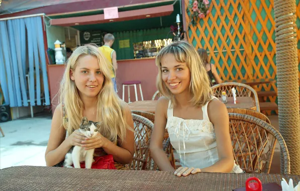 Sexy women, kitten, cat, outside, chairs, white top, beautiful face, outdoors