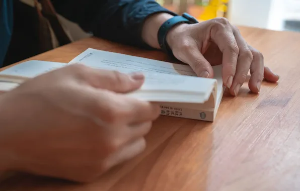 People, hands, books