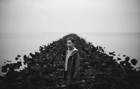 Girl, lighthouse, rainy