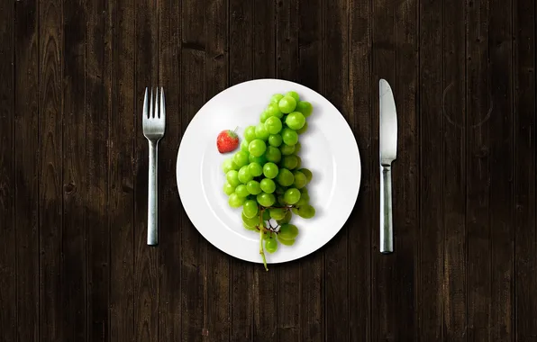 Plate, grapes, fork, knife