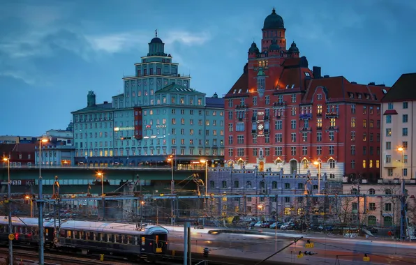 Картинка огни, здания, дома, вечер, фонари, железная дорога, поезда, Стокгольм