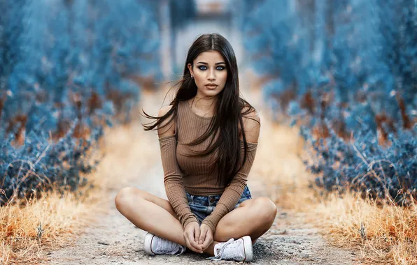 Blue eyes, women, sitting, sneakers, tanned, depth of field, legs crossed, jean shorts