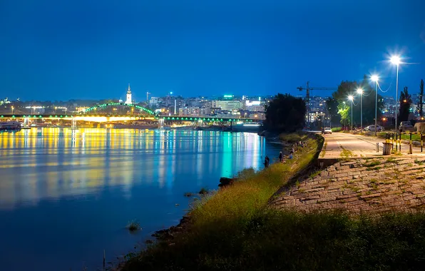 Картинка ночь, мост, огни, река, дома, фонари, набережная, Сербия