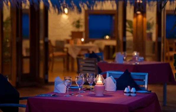 Ocean, glasses, tables, chairs, resort, restaurant, bungalows