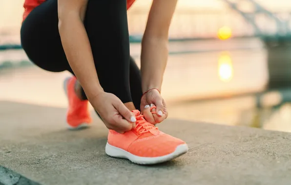 Women, sneakers, outdoor physical activity
