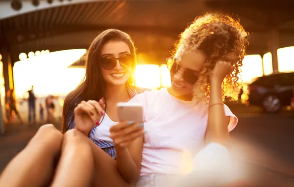 Girls, sunset, cell phone, laughter