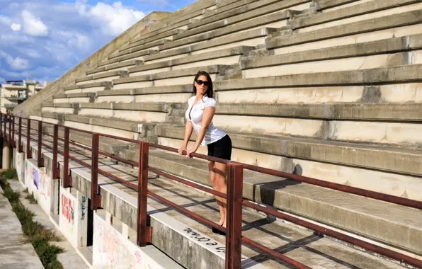 Graffiti, clouds, blue sky, lovely, outside, abandoned, white top, sunglasses