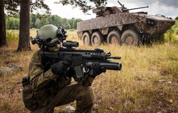 Soldier, armament, armored vehicle