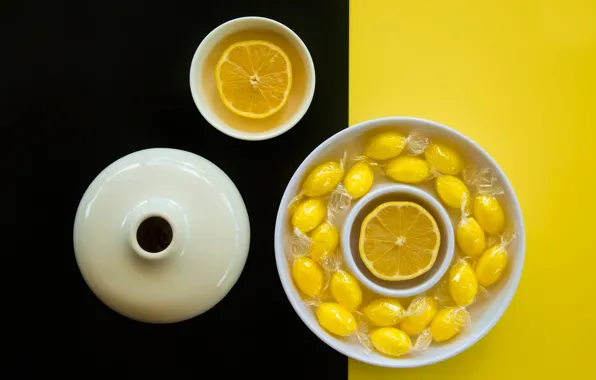 Лимон, чашка, чёрно-жёлтый фон