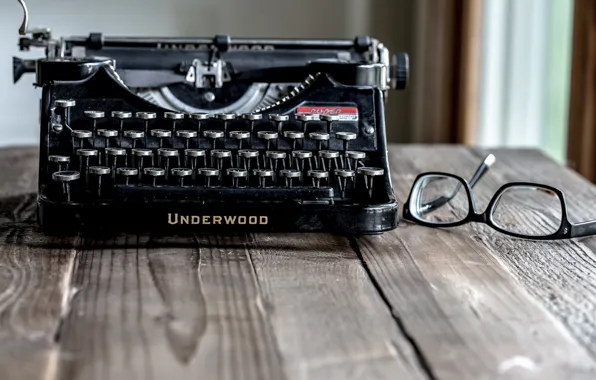 Glasses, underwood, typewriter