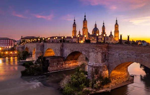 Картинка закат, мост, огни, река, дома, вечер, фонари, Spain