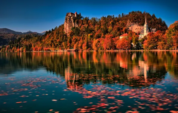 Картинка осень, пейзаж, горы, природа, озеро, скалы, листва, церковь