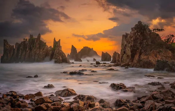 Картинка камни, зарево, море, скалы, облака