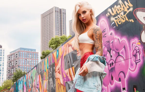 Girl, graffiti, blue eyes, model, tattoo, jeans, blonde, top