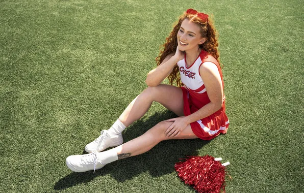 Sitting, cheerleader, outdoors