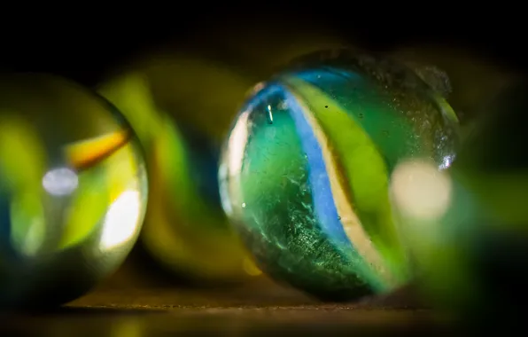 Green, glass, black and white, ball of glass