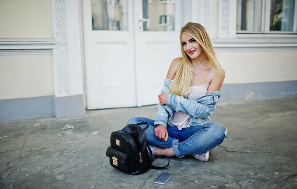 Girl, jeans, blonde, backpack, posed