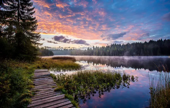 Switzerland, Jura, Sunrise at the lake