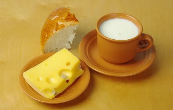Стол, сыр, молоко, чашки, блюдца