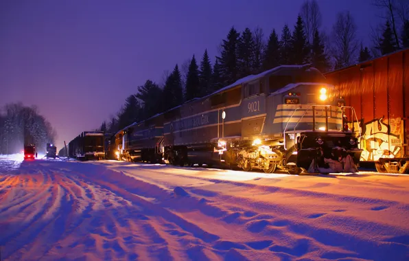 Картинка зима, лес, снег, деревья, ночь, огни, поезд, железная дорога