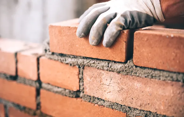 Bricks, gloves, worker