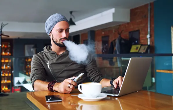 Smoke, notebook, man, wool hat, cell phone, electronic cigarette
