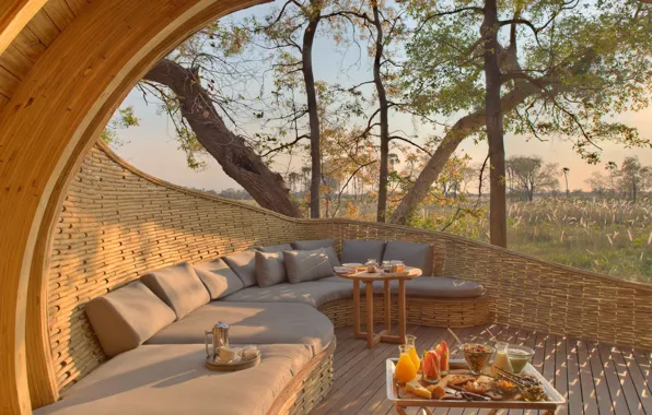Luxury, Botswana, overlooking the Okavango delta, guest area, Sandibe Okavango Safari Lodge, open lodge