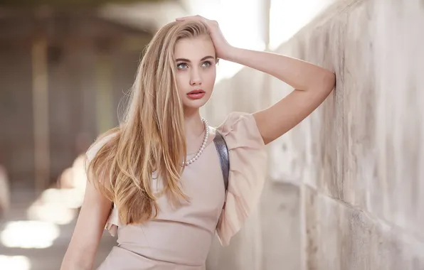 Sexy, blond, female, posing, cream dress