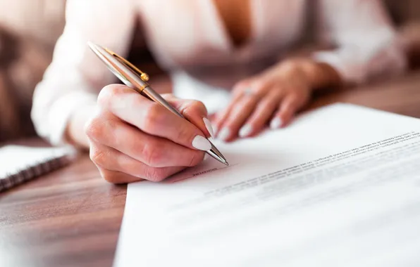 Paper, signature, contract, empowered woman who keeps half of the assets