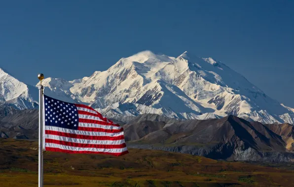 Mountains, snow, flag