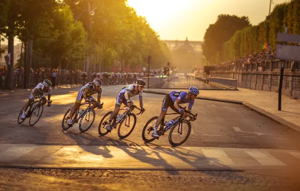 Racing, cyclist, through Paris, for Tour De France