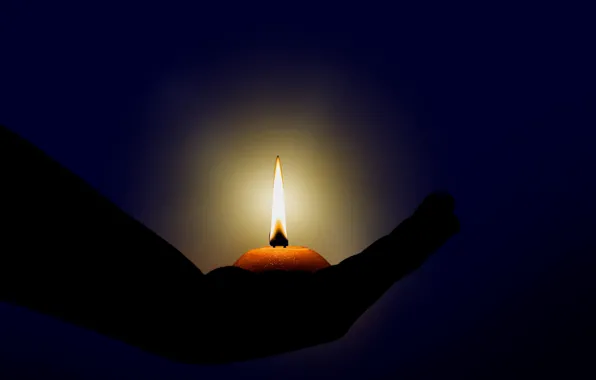 Hand, candle, light and shadow
