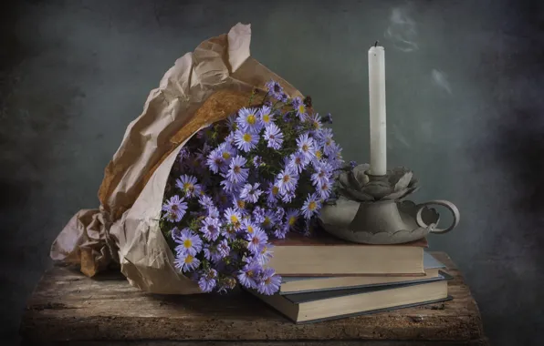 Книги, свеча, астры
