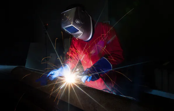 Sparks, welding, worker