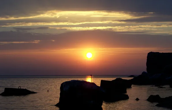 Море, вода, солнце, закат, гладь, камни, штиль