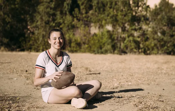 Cheerful, sitting, rugby ball, teenager