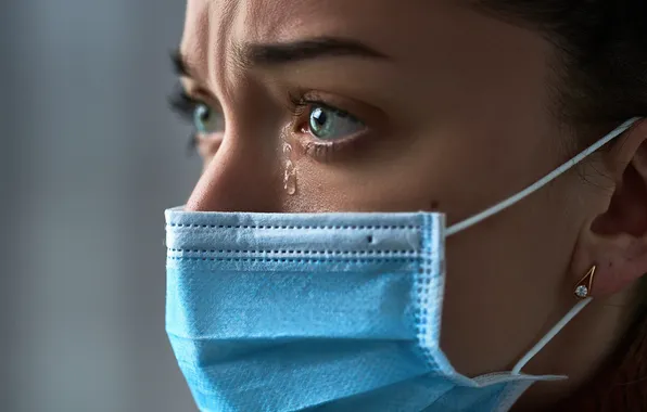 Woman, mask, tear, health system