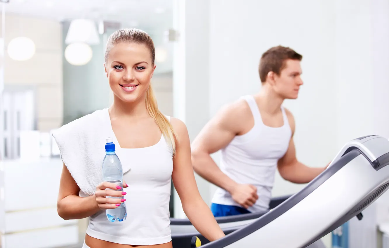 Фото обои girl, towel, gym, Fitness, water bottle, treadmill, treadmill workout, girl smiling