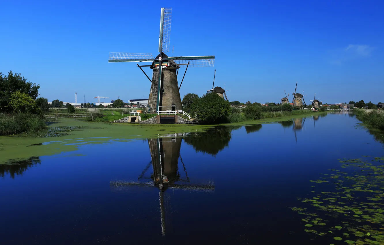 Фото обои небо, вода, канал, Нидерланды, ветряная мельница
