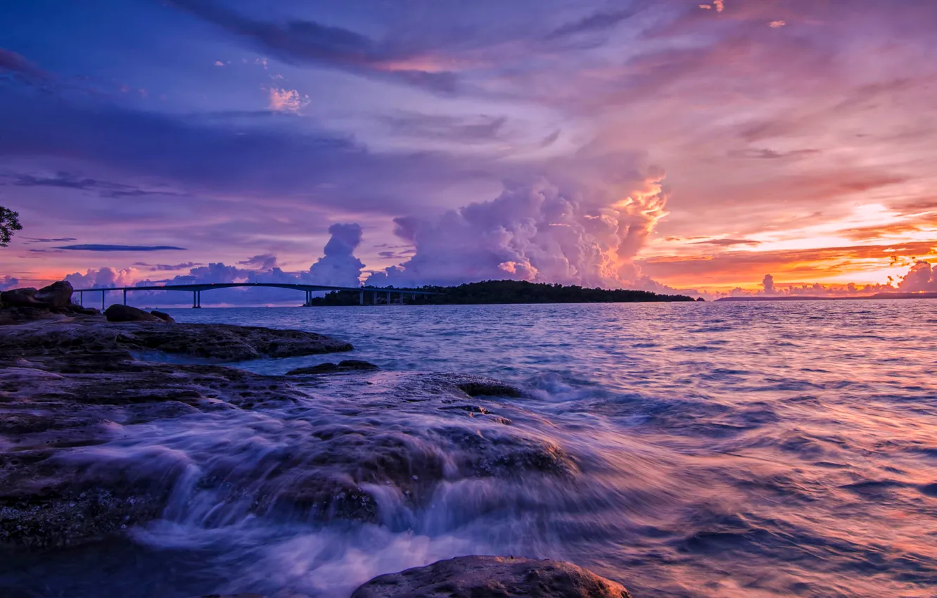 Фото обои море, небо, облака, закат, мост, камни