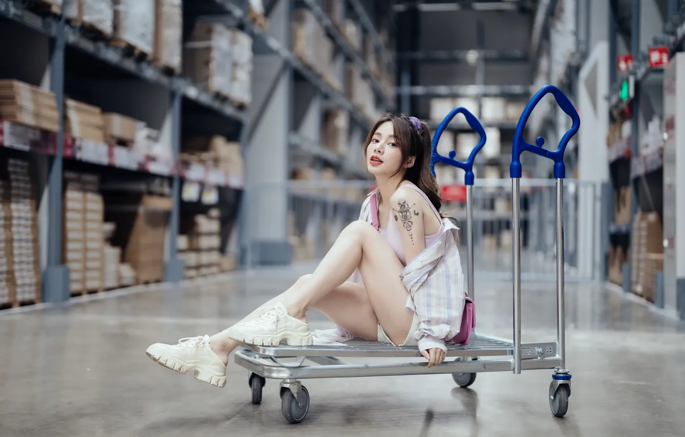 Фото обои girl, shorts, model, warehouse, asian, cute, cart, sneakers