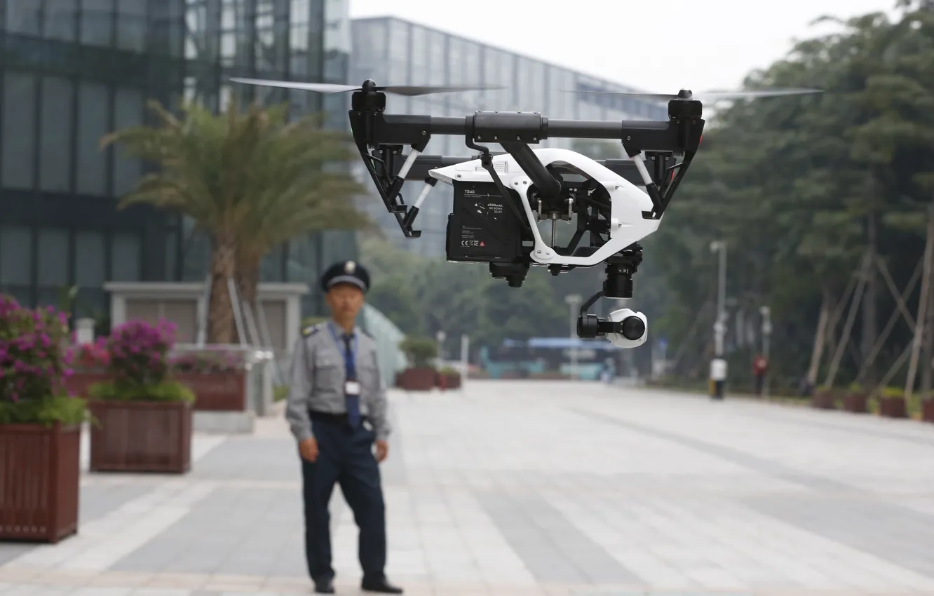 Фото обои man, uniform, technology, drone, high technology, quadcopter, high tec, dji inspire one