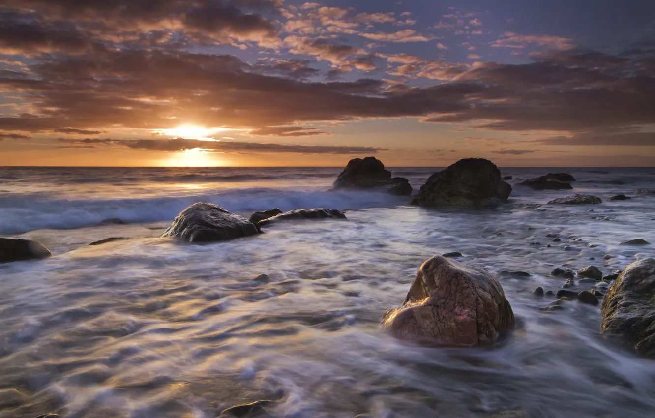 Фото обои закат, камни, Англия, England, Wales, Ирландское море, Porth Towyn, Irish Sea